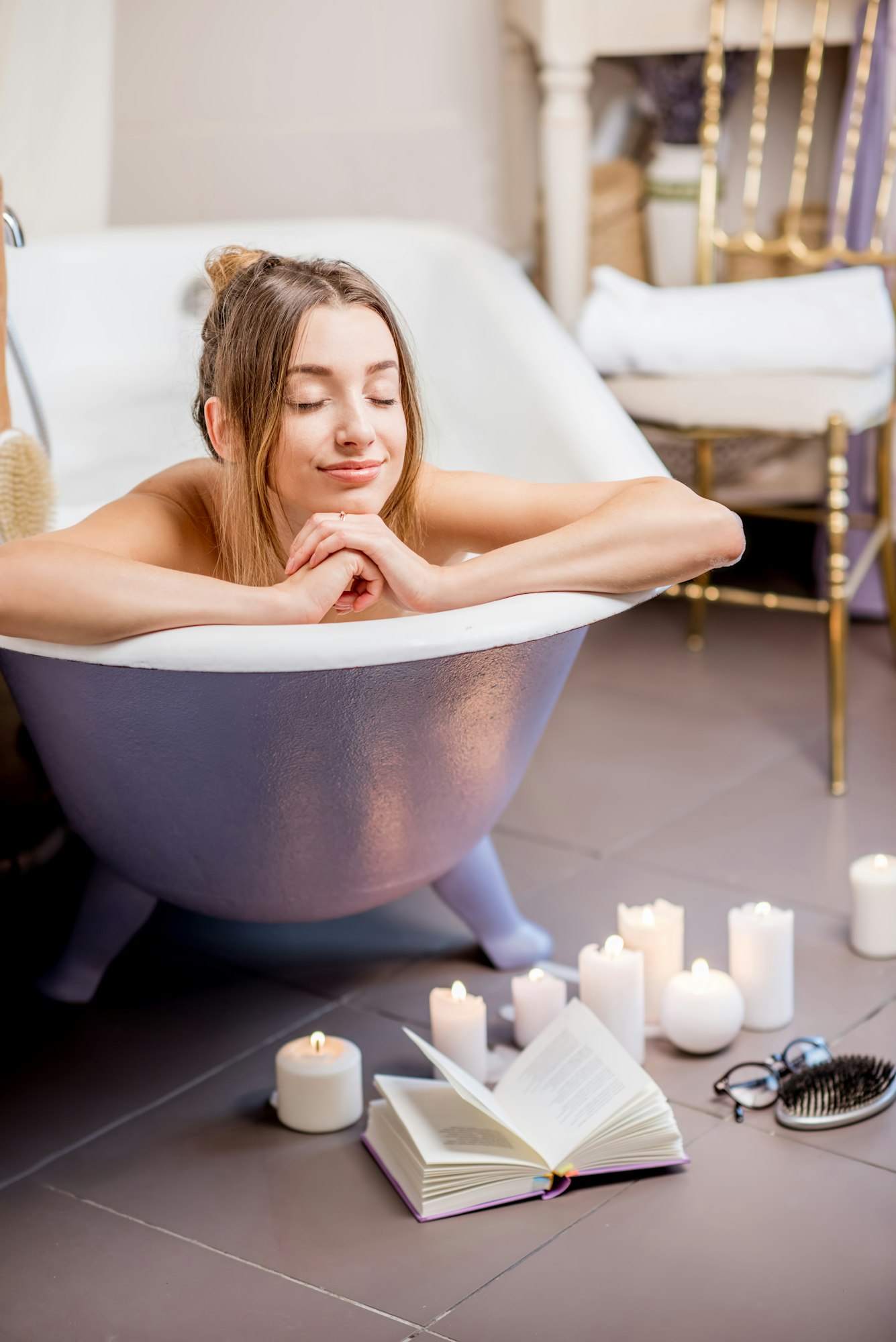 Woman bathing at the retro bathroom